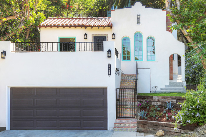 spanish style dream home pops of aqua wrought iron details