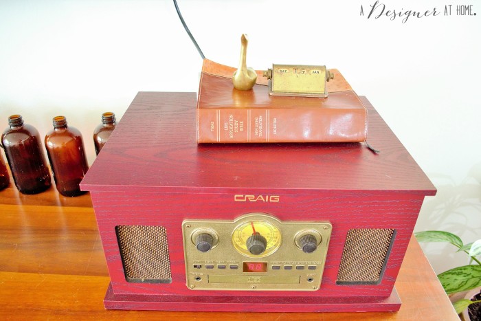 a retro inspired style record multi music player and brass pieces, it's love!