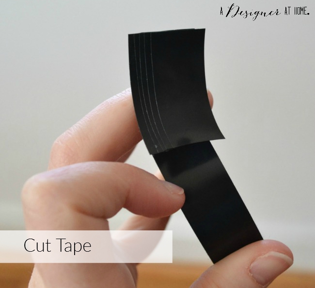 cut strips of electrical tape the same size