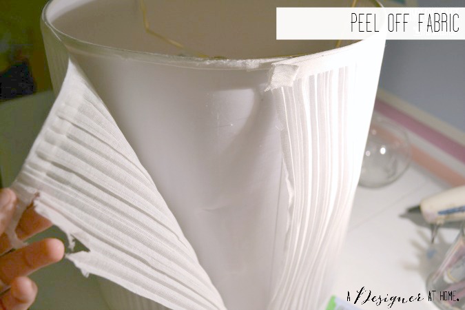 peel off fabric from lamp shade to create a base for the leather design