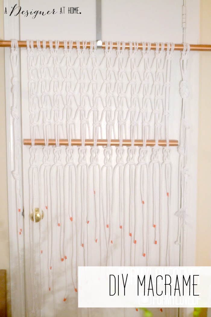 use wreath hanger on door for last minute hanger for macrame wall hanging