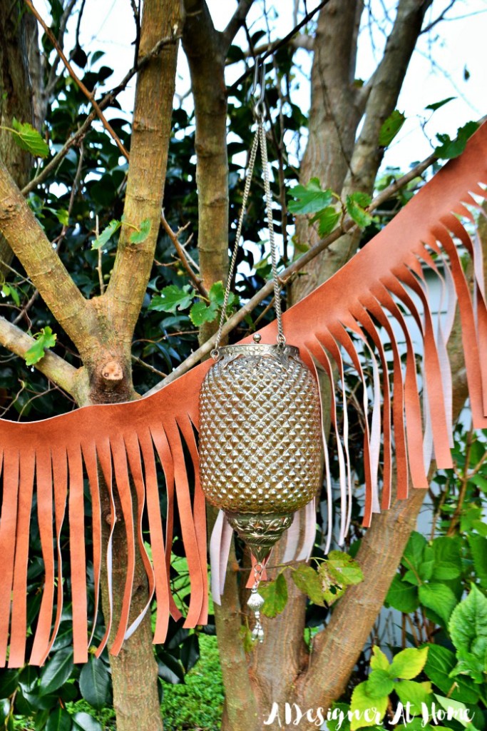 rustic-boho-eclectic-hanging-leather-fringe-banner-garland-lantern-leaves-greenery-party-dinner-wedding-decor