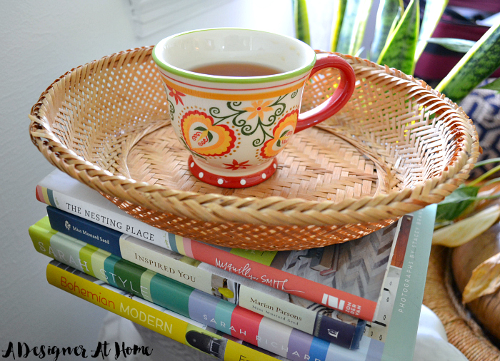 thrifted-tea-cup-with-boho-design-and-table-side-basket