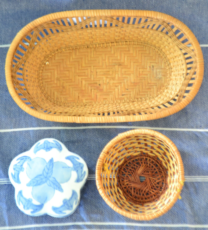 Thrifted baskets and lidded ceramic jar. 