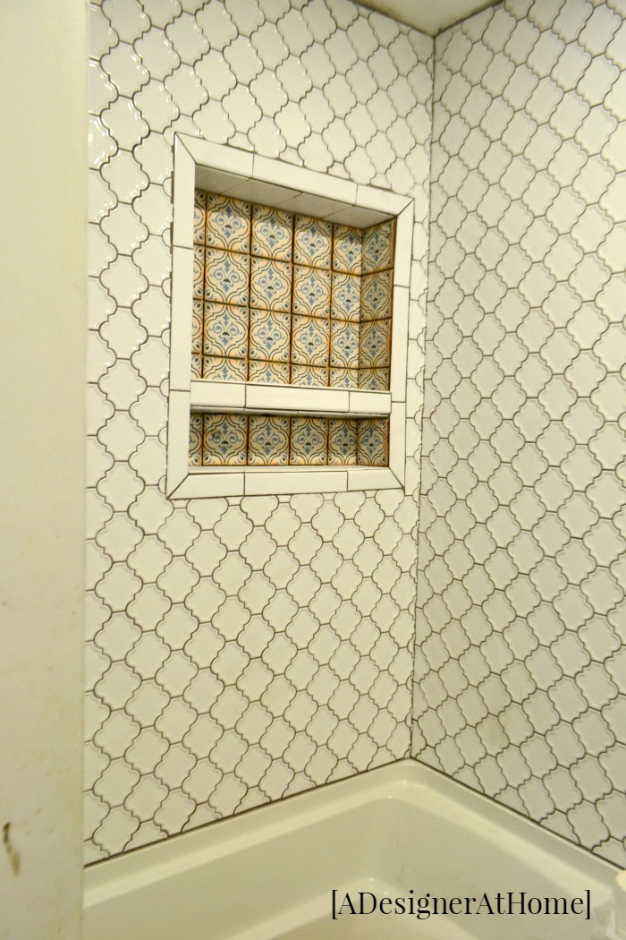 A Boho Globally Inspired bathroom renovation using patterned moroccan inspired tiles