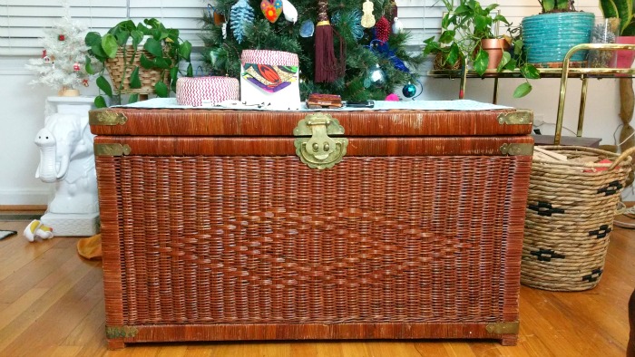 ornate brass details wicker trunk boho