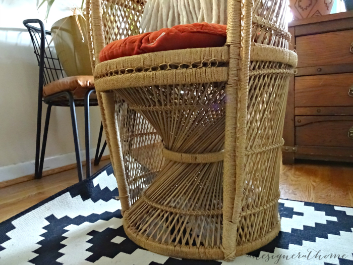 base of boho peacock fan back chair woven wicker thrifted second hand
