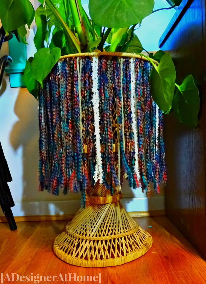 boho fringe yarn skirt on vintage wicker plant stand - handmade creativity - it's so ugly it's cool challenge - adesignerathome