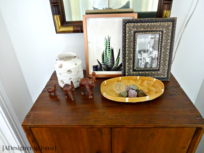 boho thrifted decorated hallway cabinet