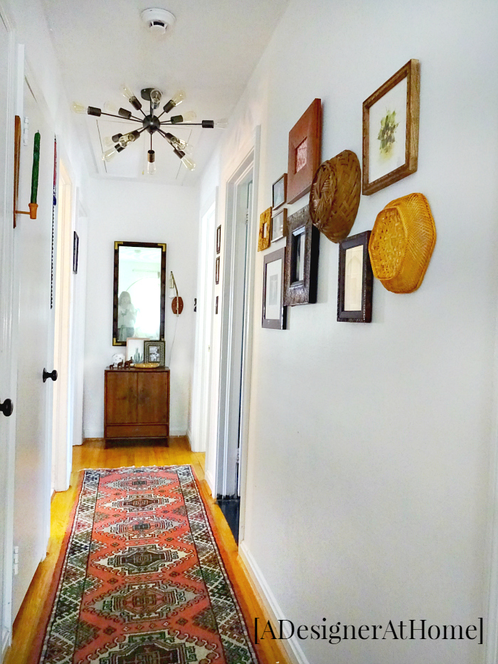 homey cozy touches, vintage details and a gallery wall for this bright hallway