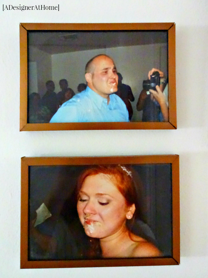 husband and wife candid cash smash photos from the wedding day hung in their hallway