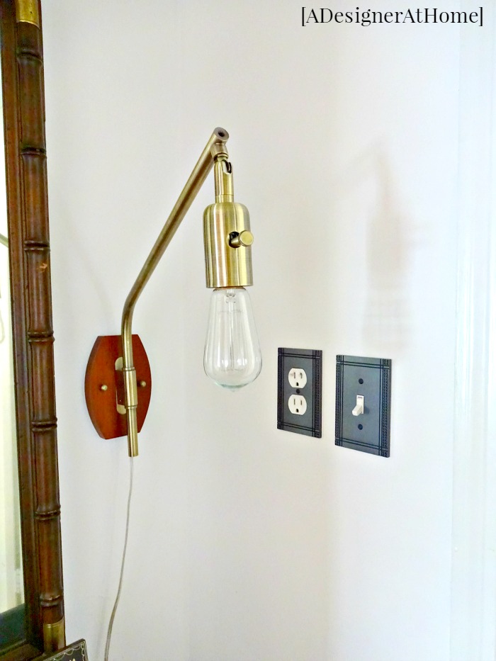 swingarm dimmable lamp adds multifuncional additional lighting for the hallway. changing out switchplates adds a custom and upgraded feel.