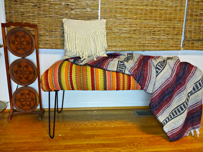 Boho eclectic bench using a discontinued world marke bench with hairpin legs- it's like the calypso bench!