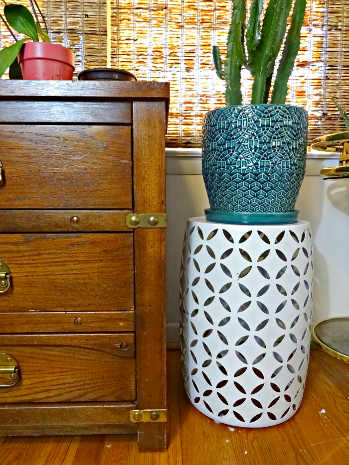 eclectic bohemian interiors old wooden dresser as dining room buffet and geometric teal planter with cactus