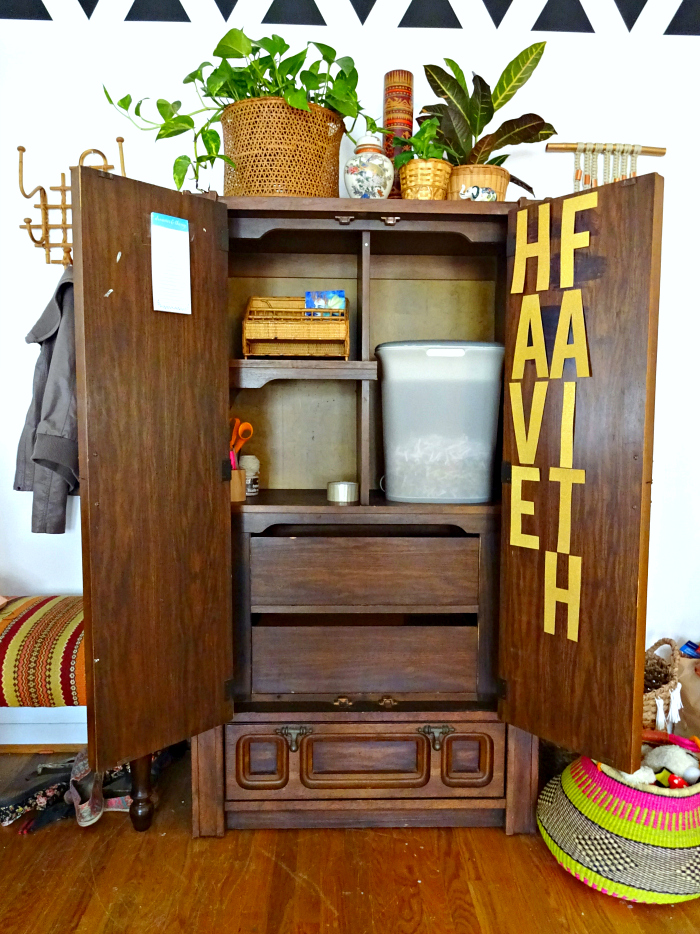 cabinet for hiding office and craft supplies