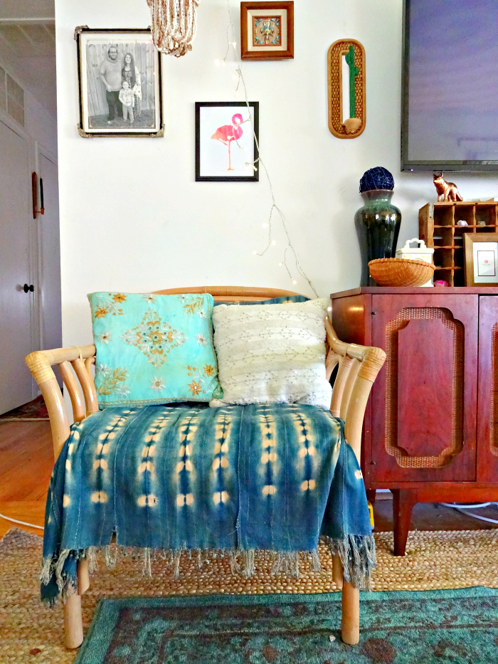 rattan chair with faux upholstery job using vintage indigo mud cloth