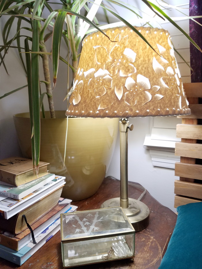 Perforated lamp shade flower design