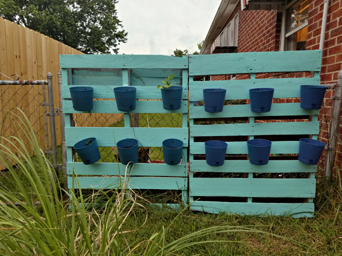 pallet fence with planter pots