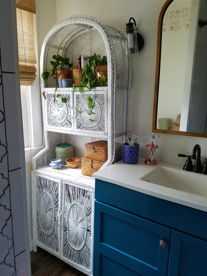 bohemian bathroom decorating and renovation: blue vanity and wicker cabinet