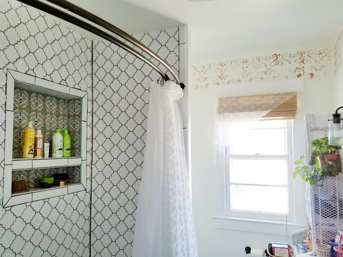 A white and blue bathroom with global influence and bohemian style