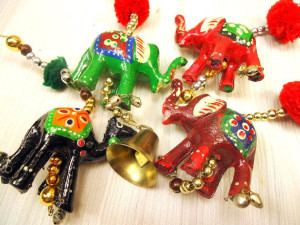 hand carved elephant ornaments via CherryBerryVintage on Etsy