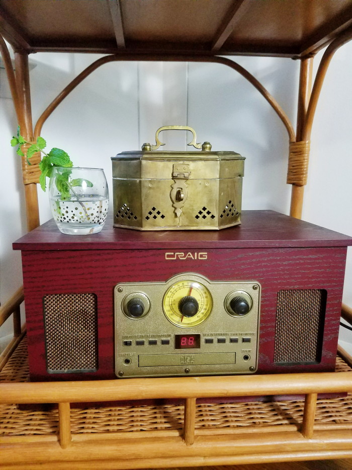 Brass trunk on vintage inspired stereo