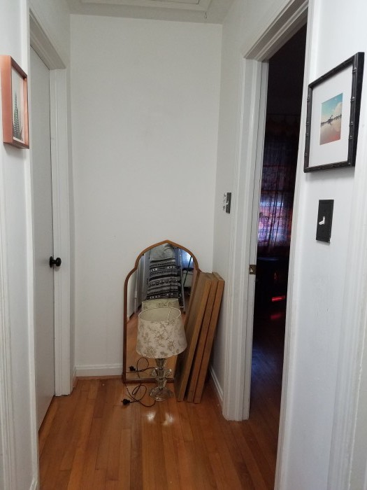 Mirror was taken from another room, lumber is for a DIY console table to add weight and warmth to the end of the hallway.