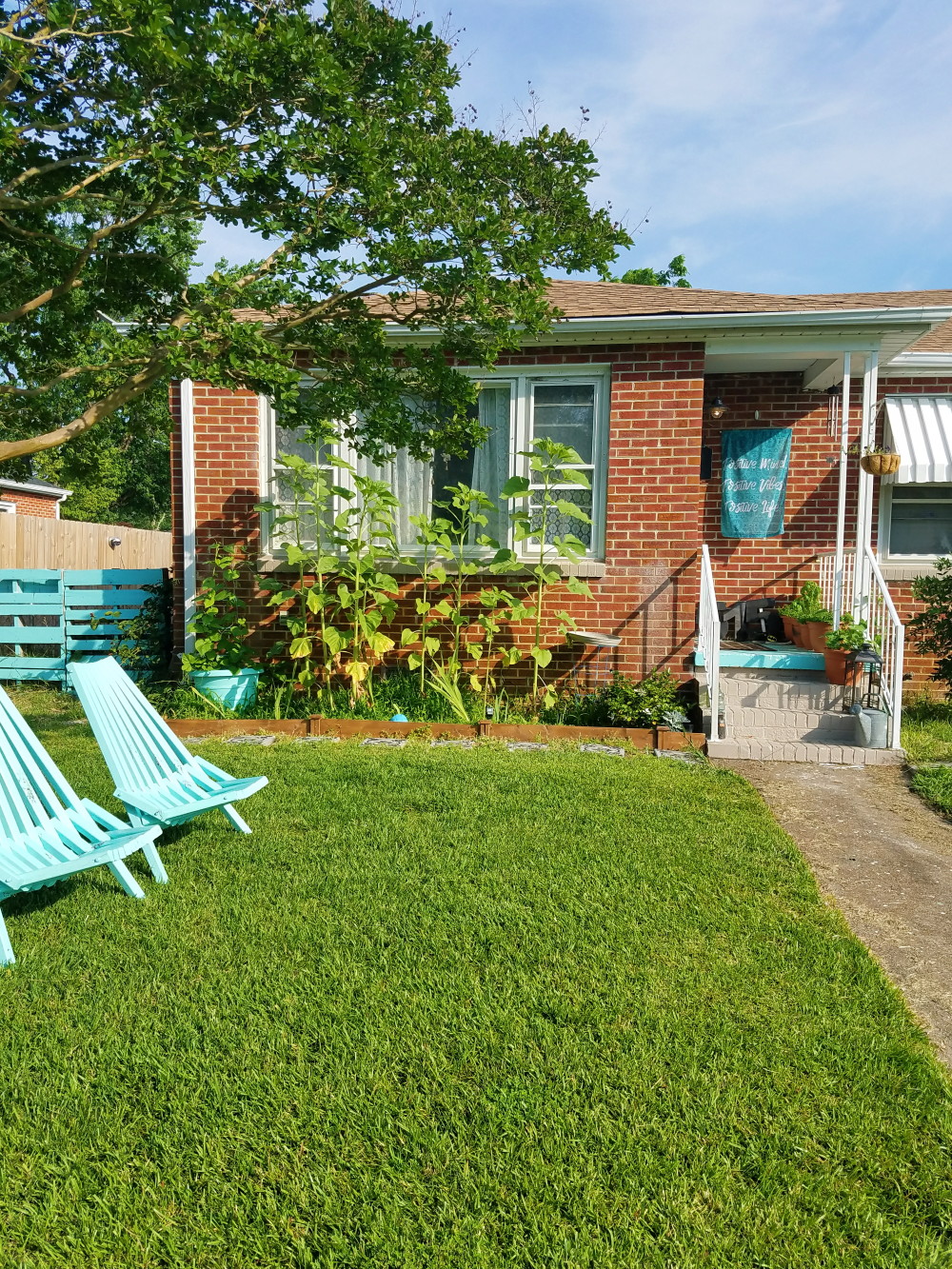 Basic brick ranch with cottage bungalow curb appeal. Curb appeal in progress @adesignerathome