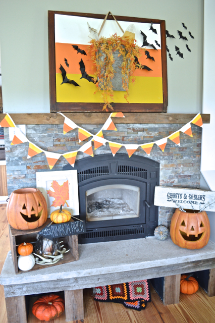 Halloween-Mantel-NewlyWoodwards4-candy-corn DIY halloween decorations