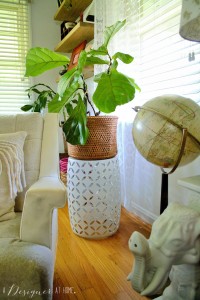 garden stool with a woven basket planter looks so cute together!