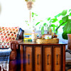 VIntage Cabinet and Vinyl Sofa bohemian decorating family loved living room