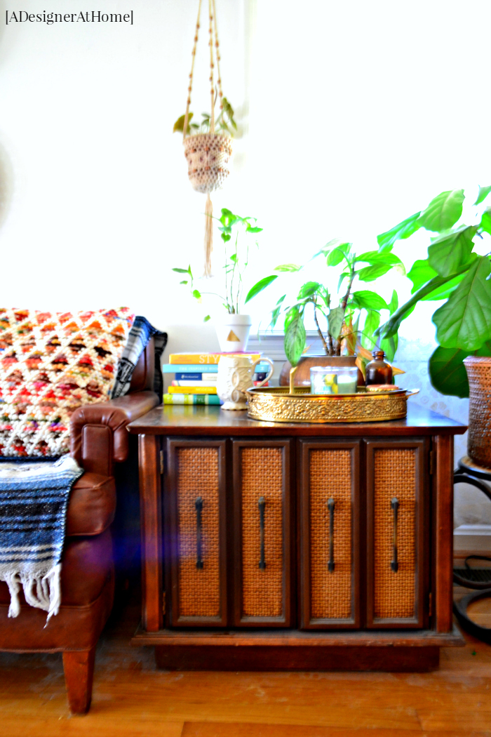 VIntage Cabinet and Vinyl Sofa bohemian decorating family loved living room