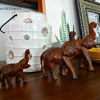 vintage wooden elephants and a lantern