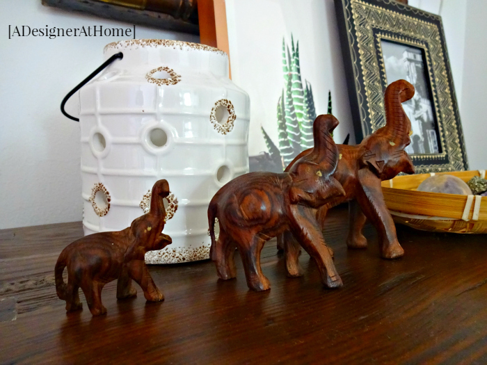 vintage wooden elephants and a lantern