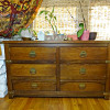 beat up old wooden dresser from craigslist with unique brass hardware for 20 dollars