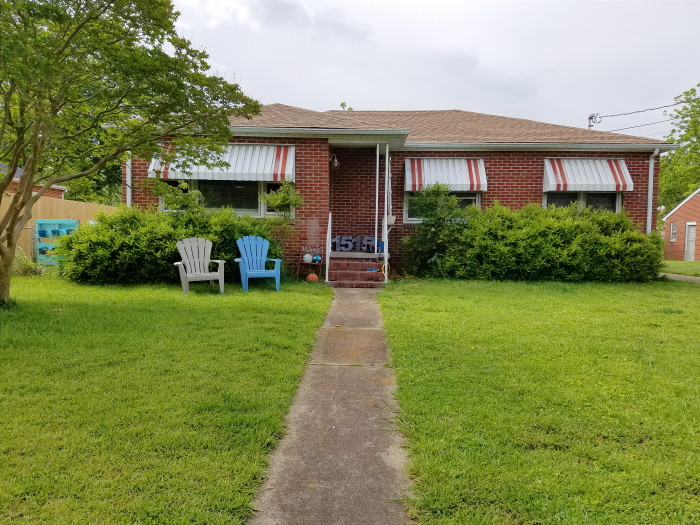 1950's built brick home before a curb appeal makeover project