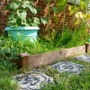Encaustic tile look alike yard pavers and customized raised garden bed kit. Aqua yard details - @adesignerathome